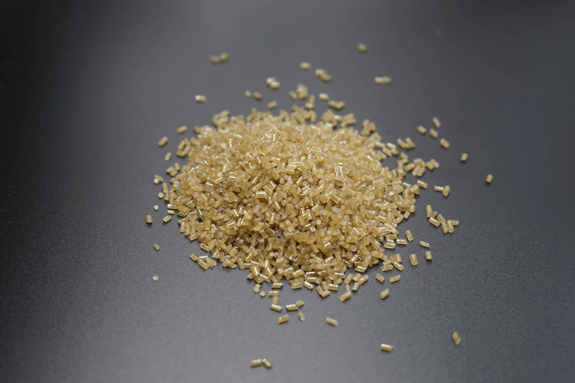 Raw material pellets from the supplied project photographs